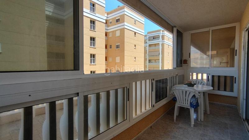 Foto e80f7bf3-9274-4d9d-890a-673e622b0cc9. Apartamento  bajo esquina de 2 dorm en urb con piscina y terraza y entrada independiente de la escalera común en Elche / Elx