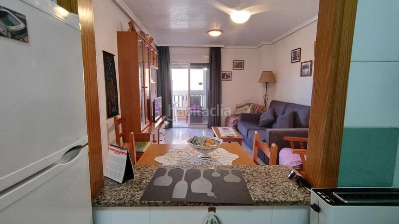 Foto ec49004f-62f3-4598-aa8a-a18b485b0e79. Apartamento  bajo esquina de 2 dorm en urb con piscina y terraza y entrada independiente de la escalera común en Elche / Elx