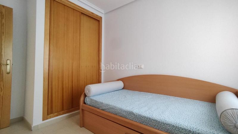 Foto 1066d889-cebc-4b1f-9e5f-f044c32e3803. Dúplex  3 dormitorios y 2 baños con solarium y sótano en urb con piscina comunitaria en gran alacant en Santa Pola
