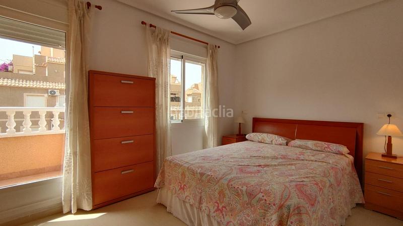 Foto 6f960ef2-e9b7-4b2e-9abb-5f4cbfc929eb. Dúplex  3 dormitorios y 2 baños con solarium y sótano en urb con piscina comunitaria en gran alacant en Santa Pola