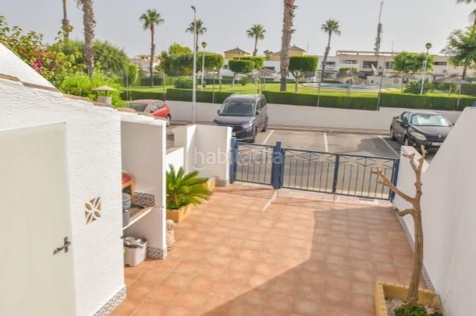 Foto 4e2501b3-58a9-49ea-9b30-268ef041f012. Casa amb calefacció aparcament piscina a Monte Faro-Altomar II Santa Pola