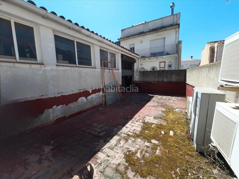 Foto c2a3930e-45c9-4429-a0c8-7584e7eb023e. Local comercial en porxada en Centre Granollers
