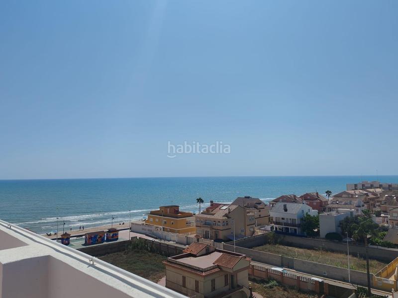 Foto ff148f8e-d2db-4e01-b80b-3736ee806520. Etagenwohnung in El Perelló Sueca