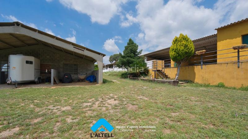 Foto f49de377-4168-4470-ac88-590e9c9f76f0. Masía en Bigues i Riells del Fai