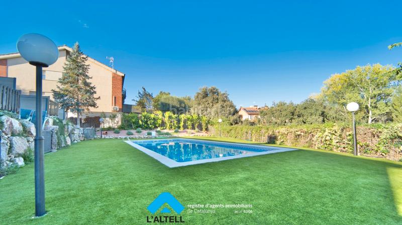 Foto 651aad3e-9ac4-48ef-a99d-c397ca5a03a0. Casa adossada amb calefacció aparcament piscina a Ametlla del Vallès (L´)