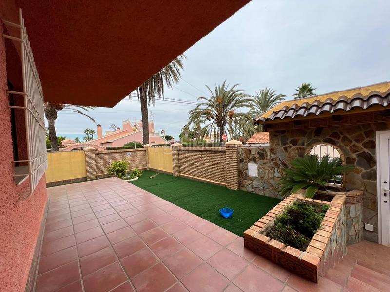Foto c28eccbd-5efe-49ac-ae7f-314dc5d075b4. Chalet in carrer carrer de baliza 1 in Cabo Roig Orihuela