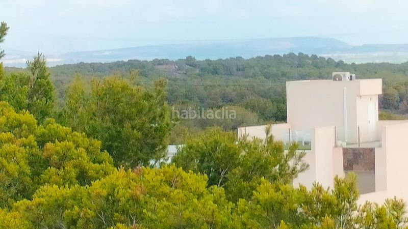 Foto a05b9800-105c-4888-859a-ede1d2dde9a5. Reihenhaus mit parking pool in Los Almendros Orihuela