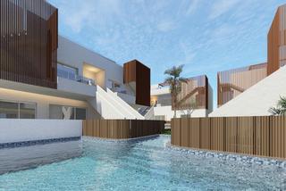 Maison à Pilar de la Horadada Ciudad. Bungalows de obra nueva con piscina comunal en pilar de la horad