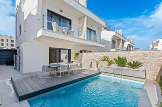 Casa aparellada a Los Secanos. Chalets adosados de obra nueva en guardamar del segura