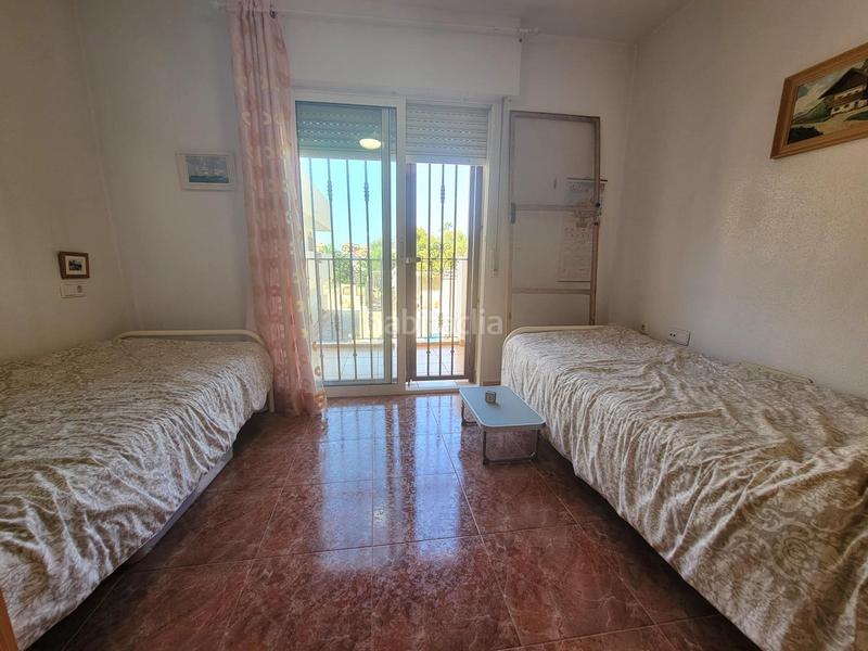 Foto 2593aa54-e656-41cb-aea1-85e029398209. Casa adossada amb aparcament piscina a Playa Flamenca Orihuela