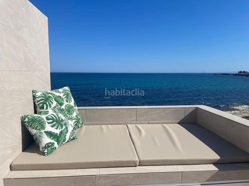 Foto 26e242d3-c823-4066-8402-5a7a2a4df52d. Casa primerisima linea en cala del moro en Miramar - Torre del Moro Torrevieja