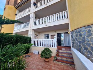 Apartament a Lomas de Cabo Roig - Los Dolses. Acogedor apartamento con 2 terrazas, piscina y aparcamiento en l