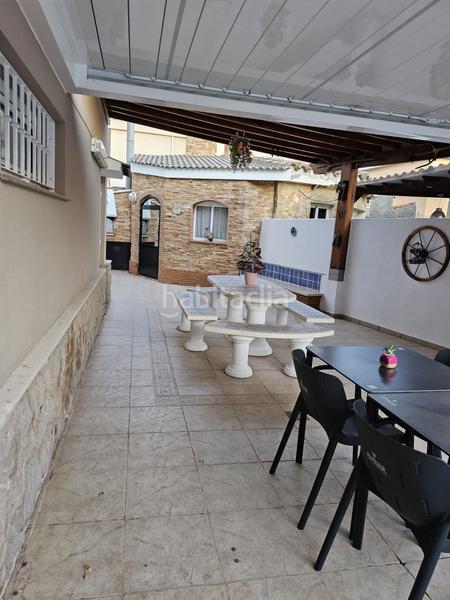 Foto c705356c-970a-4827-bfa4-7fa34bf0799e. Chalet with heating parking in Playa Burriana