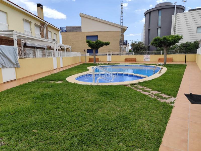 Foto cf0cf6f5-41df-402d-b68b-7bfae142f807. Casa a schiera con parcheggio piscina in Llombai Burriana