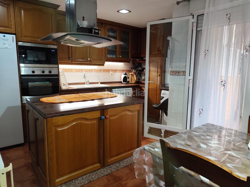 Foto e2950745-b375-49cc-ab24-9b3e25910ce0. Casa a schiera con parcheggio piscina in Llombai Burriana