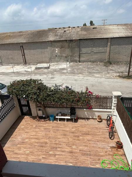Foto 74f66e9d-9e5e-4d68-b1bb-a6fc3dba4568. Casa a schiera con parcheggio in Playa Burriana