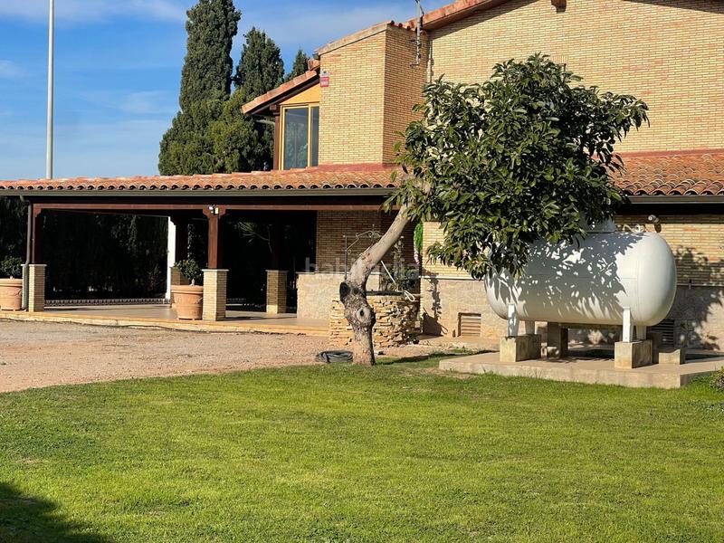 Foto 5fd46570-a456-40e7-bf5f-46749558e3a6. Chalet avec parking dans Centro Burriana