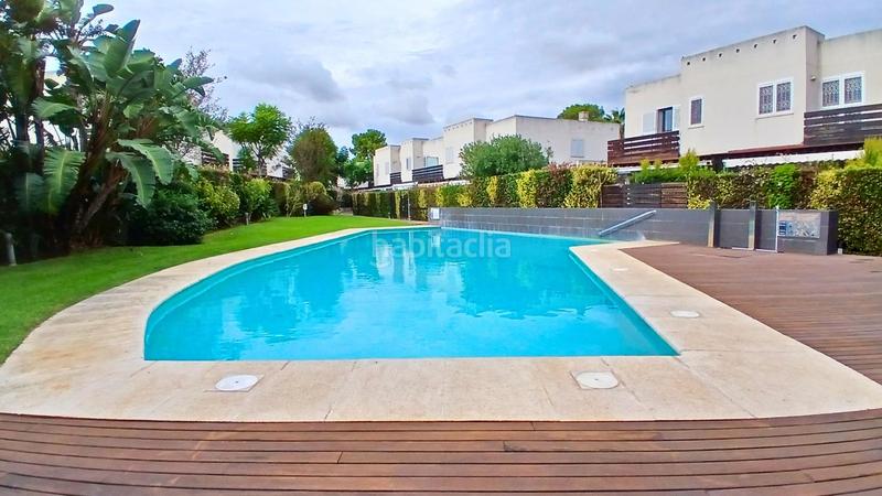 Foto f0e19402-1d07-4ba3-b0a6-00b13f31ad8c. Semi detached house with parking pool in Platja de Mont-roig Mont-roig del Camp