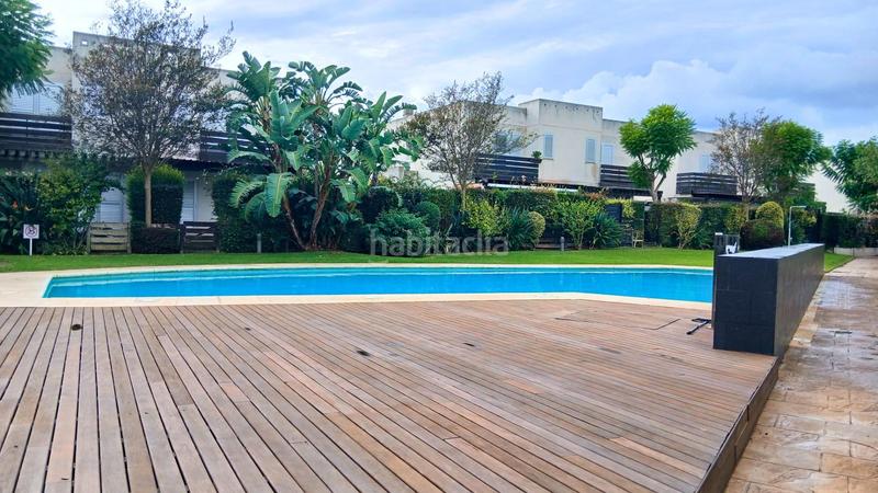 Foto fd5b7f0f-f3c7-4ecf-8766-d71e7b238283. Semi detached house with parking pool in Platja de Mont-roig Mont-roig del Camp
