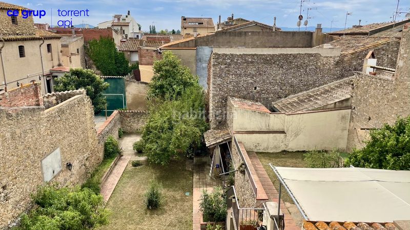 Foto b7425efe-6e82-41c7-a06c-7f719306b7e0. Country house with heating parking pool in Torroella de Montgrí
