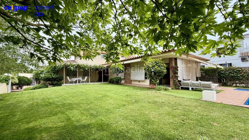 Foto 36947369-b54a-48e5-ba32-a49b961eba13. Casa amb calefacció aparcament piscina a Riells Escala (L´)
