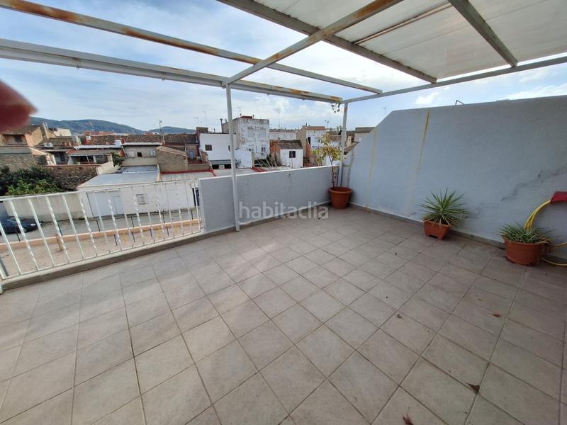 Foto b9d9fde0-d9f4-4724-b40a-8346d6dbcede. Reihenhaus mit parking in Cárcer