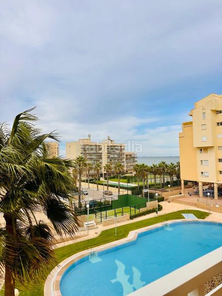 Foto 15a22331-5fd4-4901-8b0f-3b2425a3fbda. Etagenwohnung mit parking in El Perellonet Valencia