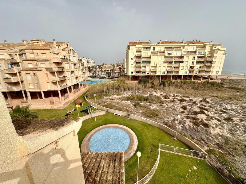 Foto e835031a-b466-4958-8a16-805c4db2cfaa. Etagenwohnung mit parking in El Perellonet Valencia