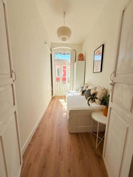 Foto 0156599e-d886-49c1-ab38-837f29bd45e6. Etagenwohnung mit heizung in Russafa Valencia