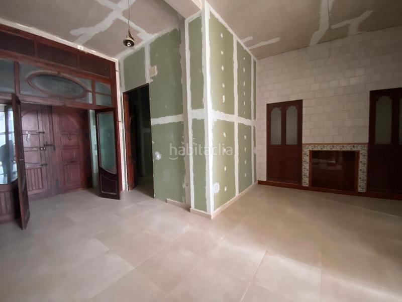 Foto ac0d6988-8f5e-4f26-b5df-07bfb7d5f4c1. Casa planta baja en grao de gandía zona puerto en Gandia