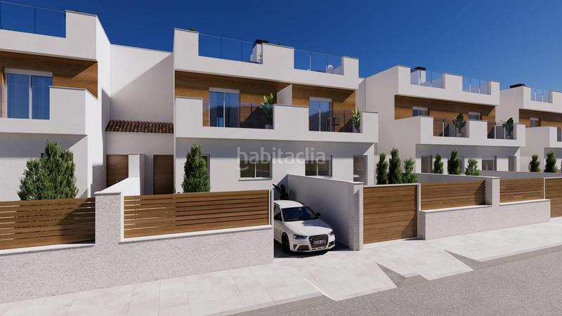 Foto bff7d3dd-df23-418c-8556-36ce490d52e4. Casa aparellada amb aparcament piscina a Las Lomas de Rame-Bahía Bella Alcázares (Los)