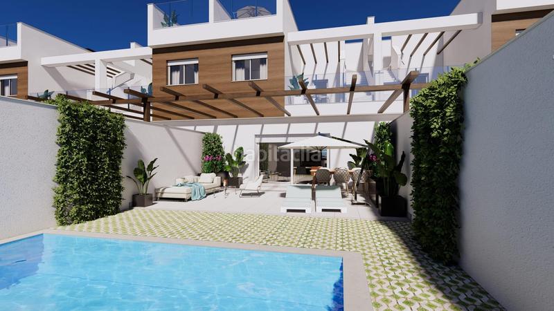 Foto 115e507f-4e52-46e8-84ca-3ec2809fcfa5. Maison jumelée avec parking piscine dans Las Lomas de Rame-Bahía Bella Alcázares (Los)