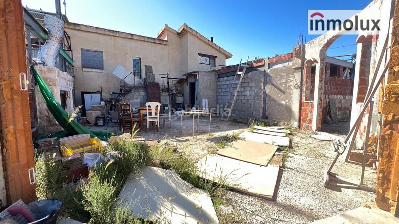 Foto c7c151d3-a354-4f48-80e6-894a0465dc5c. Chalet casa de campo con parcela de 2.400 m y múltiples posibilidades en Alicante