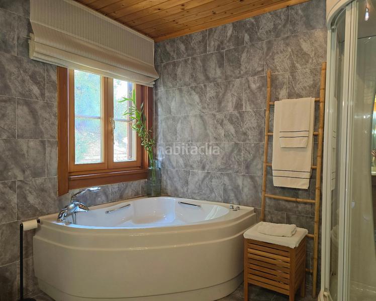 Foto 1f377acf-ee4f-4715-840a-0cdc9ec111b0. Casa  de madera de estilo nórdico en venta en la exclusiva urbanización de can duran, en Canovelles