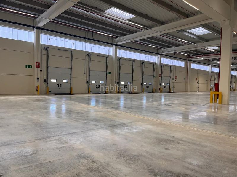 Foto 50d36bfb-b7ab-4b99-aadd-f2baa4d65410. Rent industrial building in Òdena