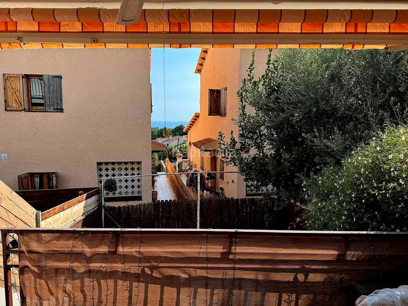 Foto 100719c7-3462-410f-8150-0b8053a706c4. Casa adossada amb calefacció a Els Masos - Els Garrofers Coma-ruga