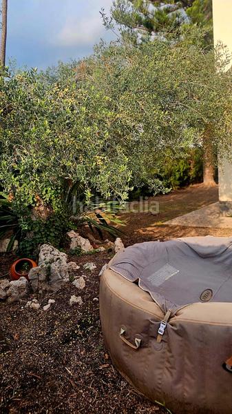 Foto 8af72cc6-4a77-4ad8-85c3-bd3edf68447e. Casa a schiera con camino in Pobla de Montornès (La)