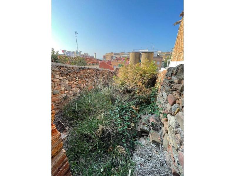 Foto 2055766c-1f26-4bed-96a8-934d407ece3e. Casa pareada casa para rehabilitar en el centro. en Ripollet