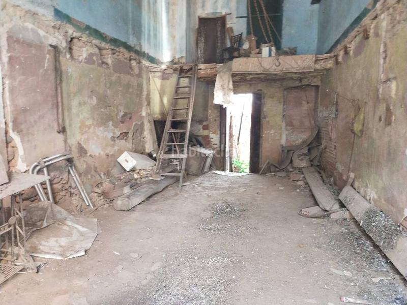 Foto 2a35bf9c-35d1-41f8-8b27-50c1f0e86ae9. Casa pareada casa para rehabilitar en el centro. en Ripollet