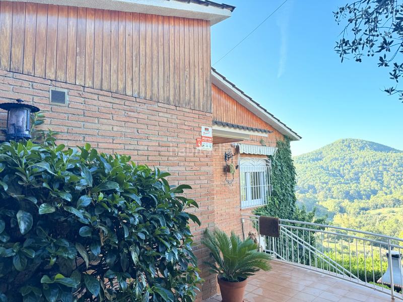 Foto 4774f566-f58f-4f41-a1f2-81066eb66611. Casa amb xemeneia calefacció aparcament piscina a Sant Feliu de Codines