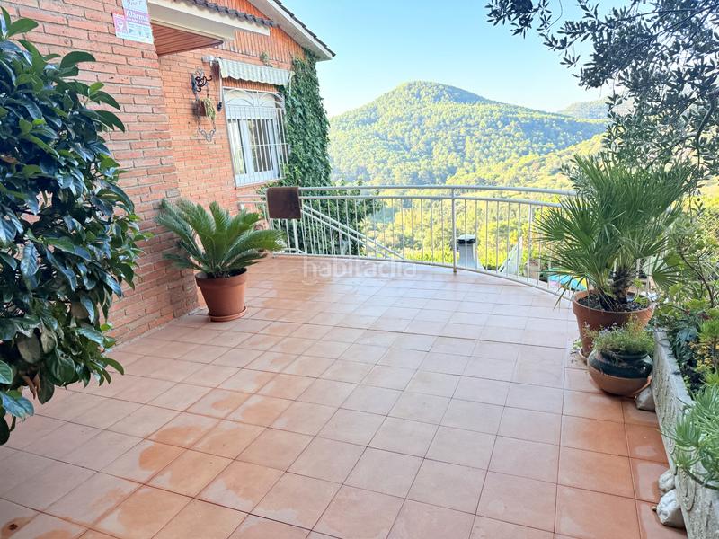 Foto 6d07cc32-e3d6-4d82-b3cd-9d6f32188b22. Casa amb xemeneia calefacció aparcament piscina a Sant Feliu de Codines