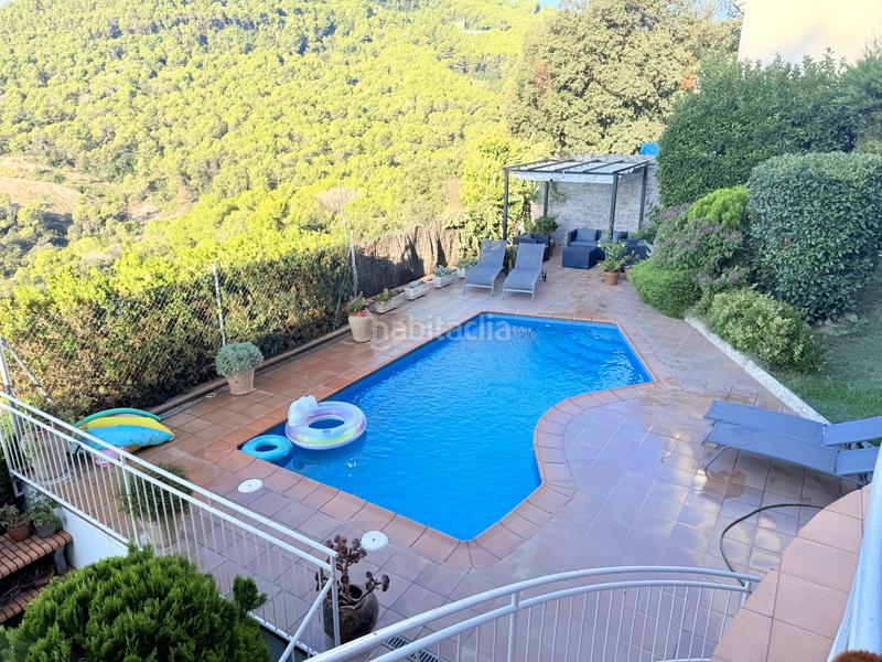 Foto b81dde86-b991-4202-add3-42e4276207a2. Casa amb xemeneia calefacció aparcament piscina a Sant Feliu de Codines