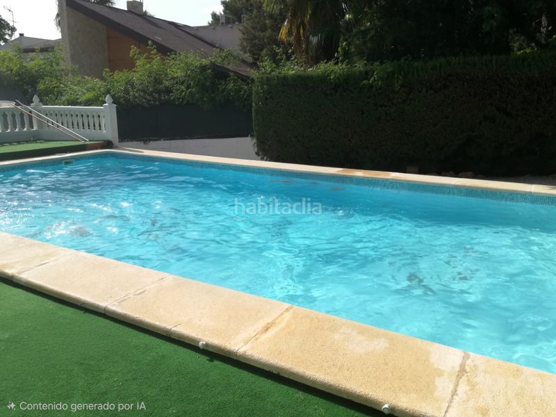 Foto 4b99d2bb-25fd-4921-9cac-e610e05e5bf3. Xalet amb xemeneia aparcament piscina a Olimar-Carambolo-Atalaya de Levante Chiva