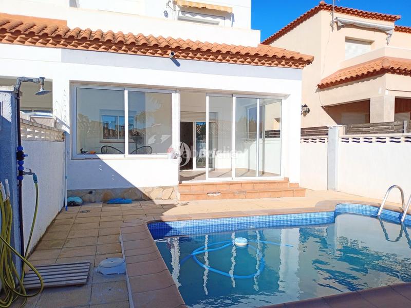 Foto 61ac31d9-b6ca-4aea-ba05-e0333d2dcebc. Maison jumelée avec chauffage piscine dans Centre Miami Platja