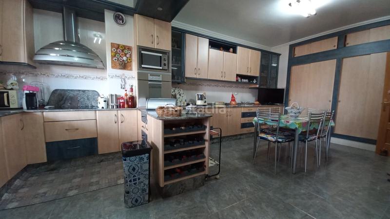 Foto 2b086313-9d35-4fc0-8fbd-73afedeaa7bd. Casa adossada amb xemeneia calefacció aparcament a Unión (La)