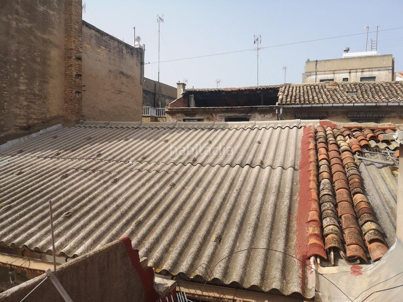Foto aa6045f4-8e32-472c-9850-c312cb8dfa6a. Casa adossada a Centre Alzira
