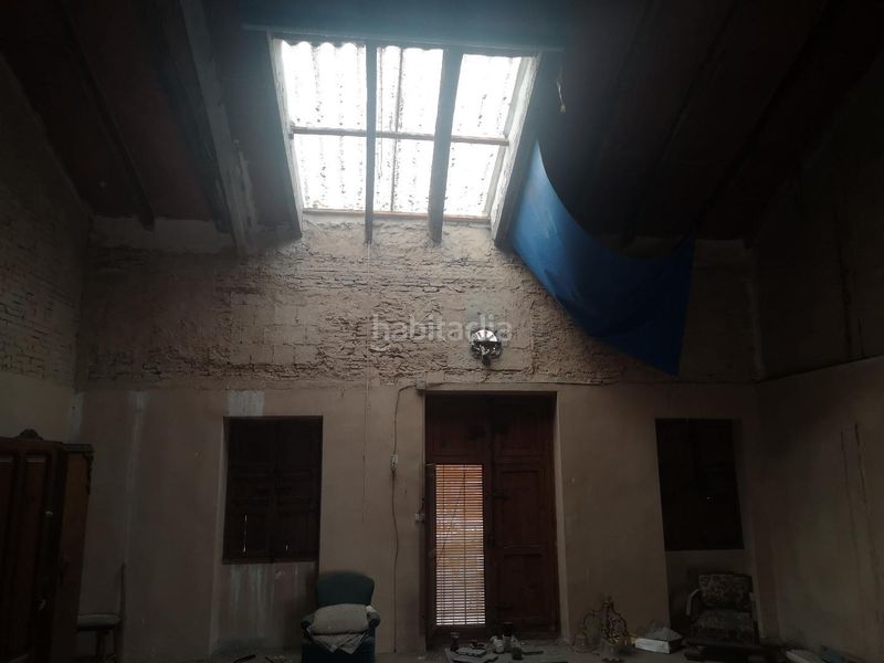 Foto f24f6f91-20aa-49bb-91c1-3e89beda00a4. Casa adossada a Centre Alzira