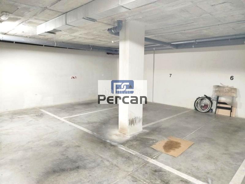 Foto 0a0f8f1b-9451-41c6-a7fe-489374682b9e. Parking voiture dans Campello Pueblo Campello (el)