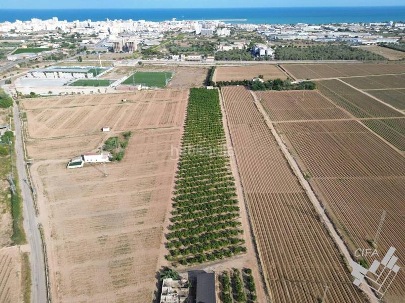 Foto 541fab94-c653-4e48-8ade-517c7b14116f. Finca rústica oportunidad única! parcela rústica en venta en plena producción de naranjos en Vinaròs