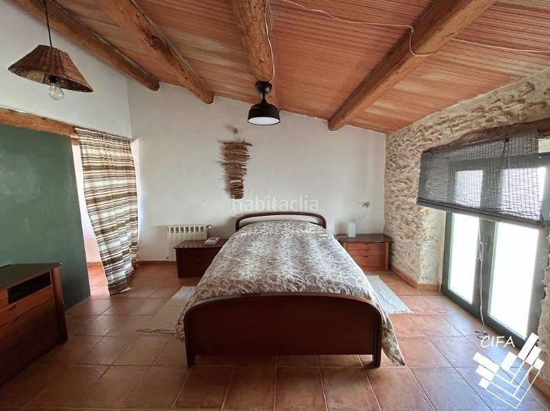 Foto bf11a8a5-ab17-4cf4-b9a7-78d4a4682124. Casa aparellada a Ulldecona